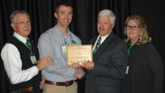 Reitz accepts award.